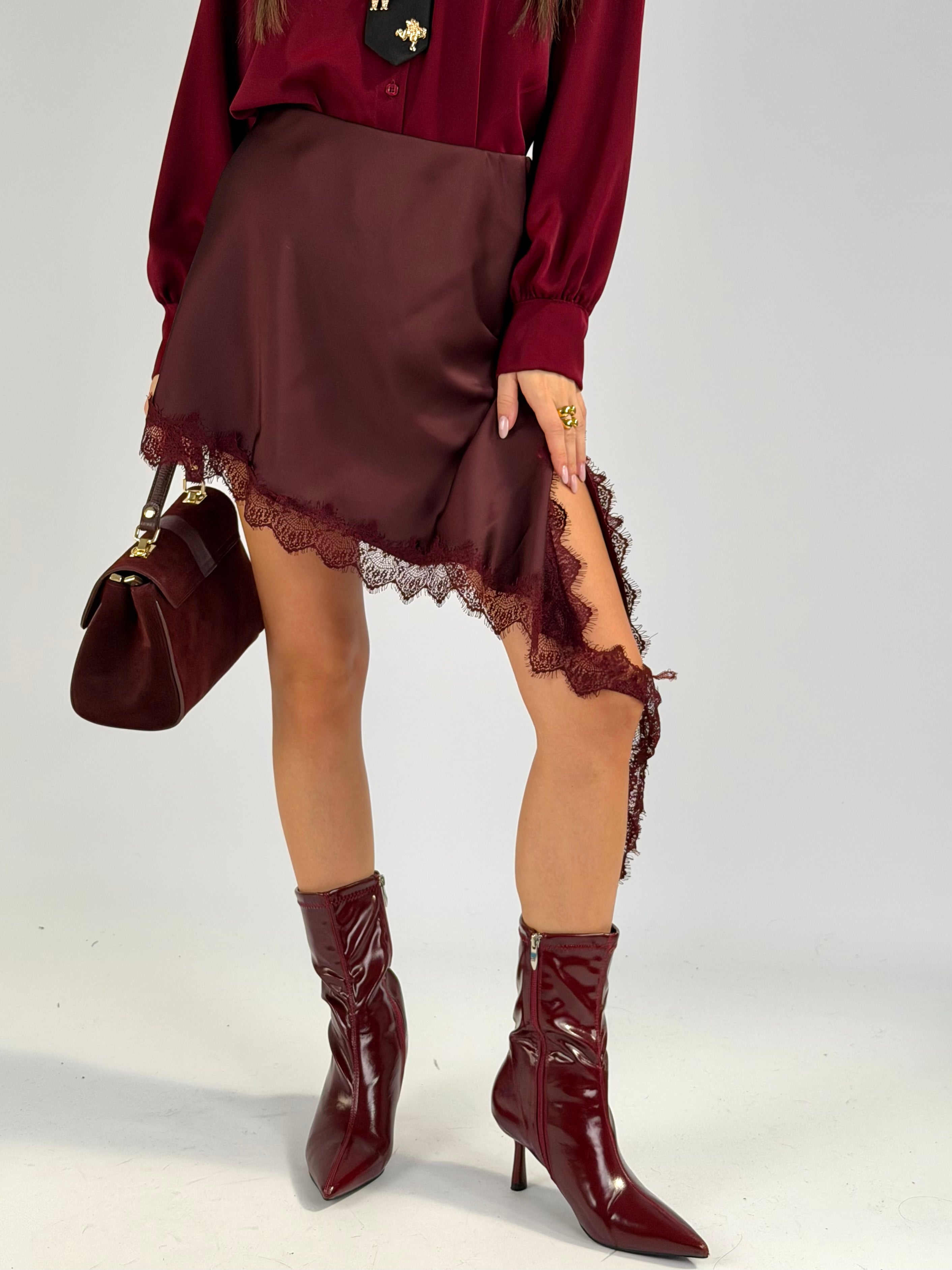 Gonna asimmetrica pizzo bordeaux