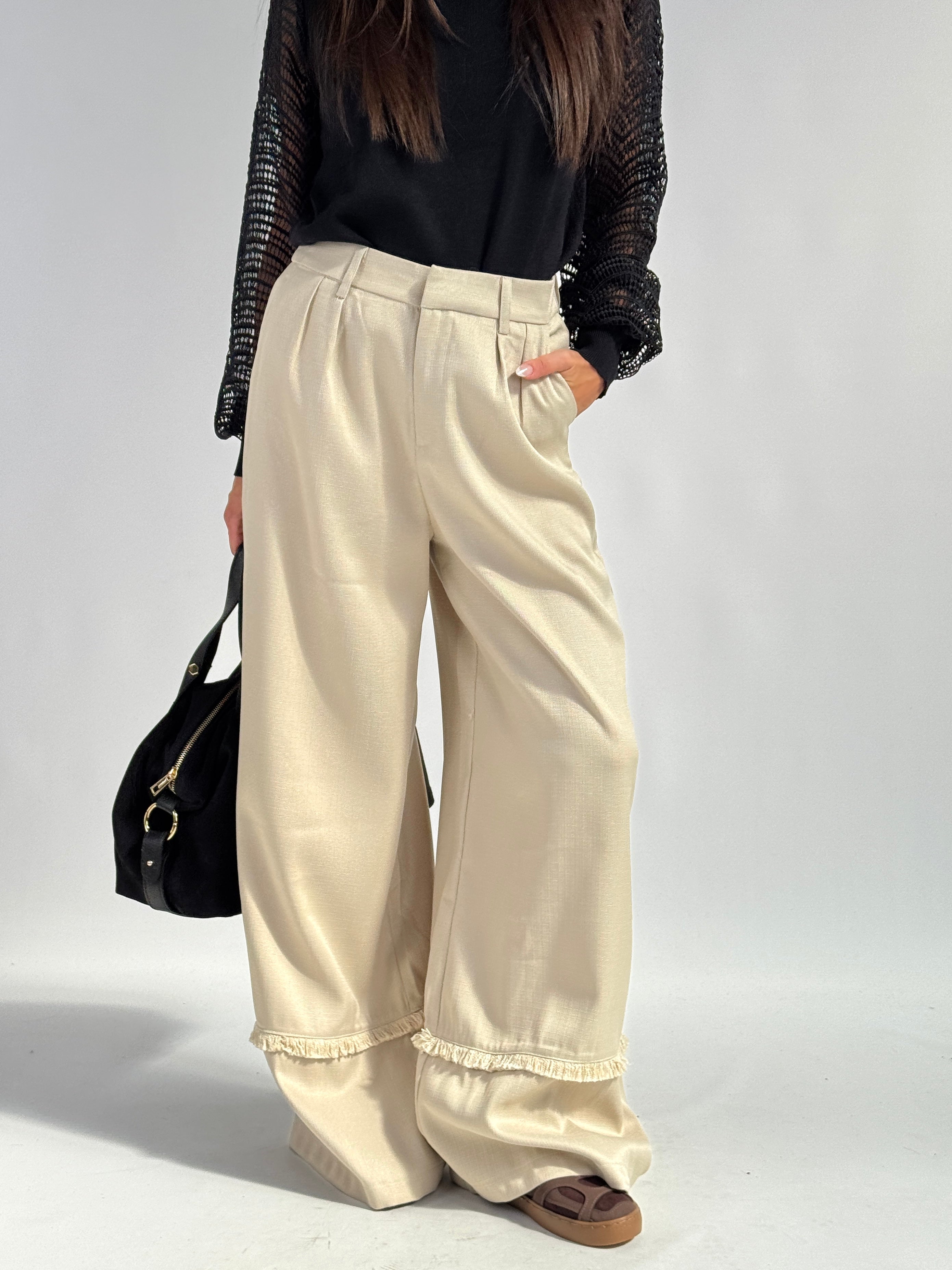 Pantalone risvolto sfrangiato beige