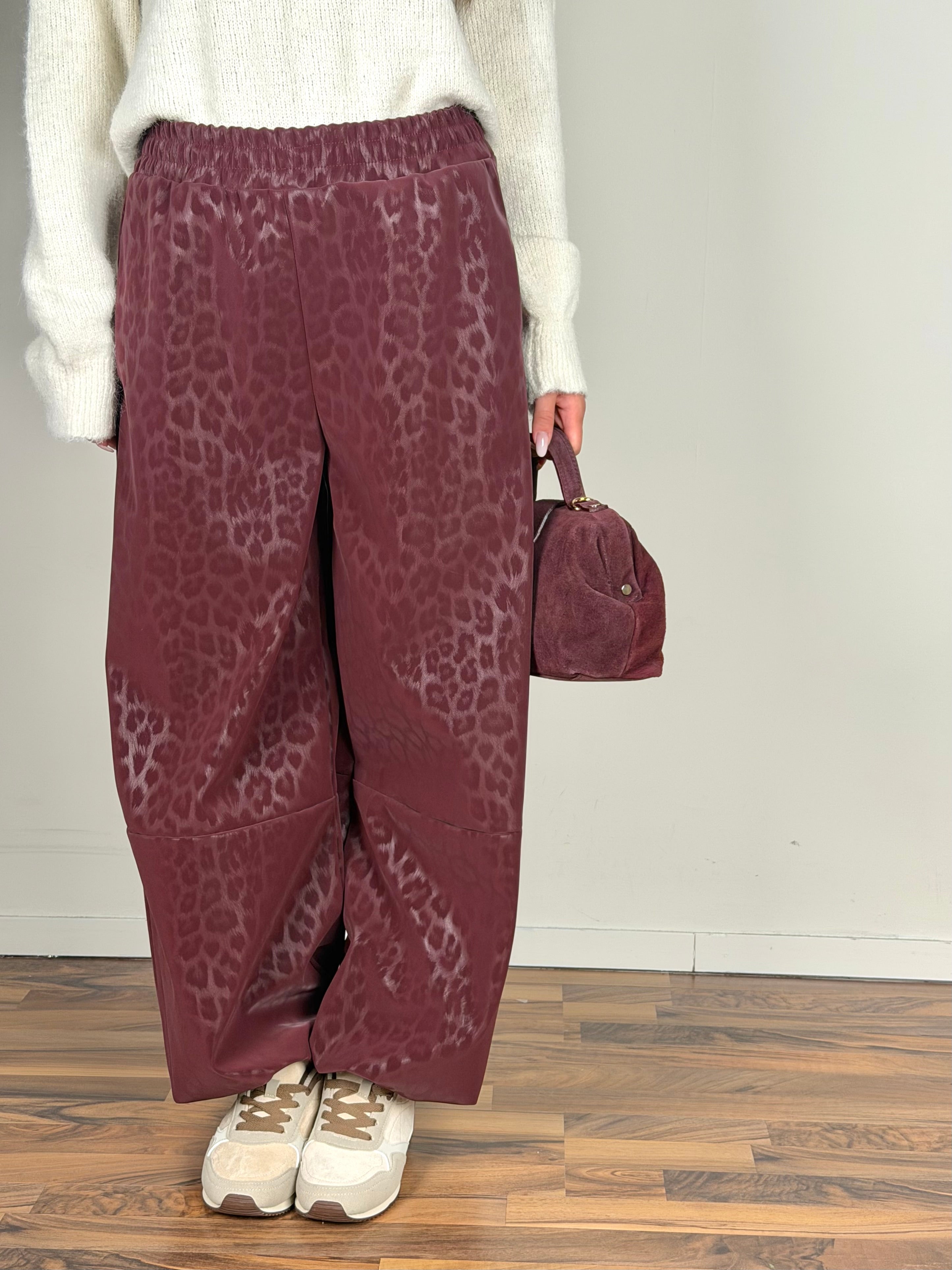 Pantalone ecopelle maculato bordeaux