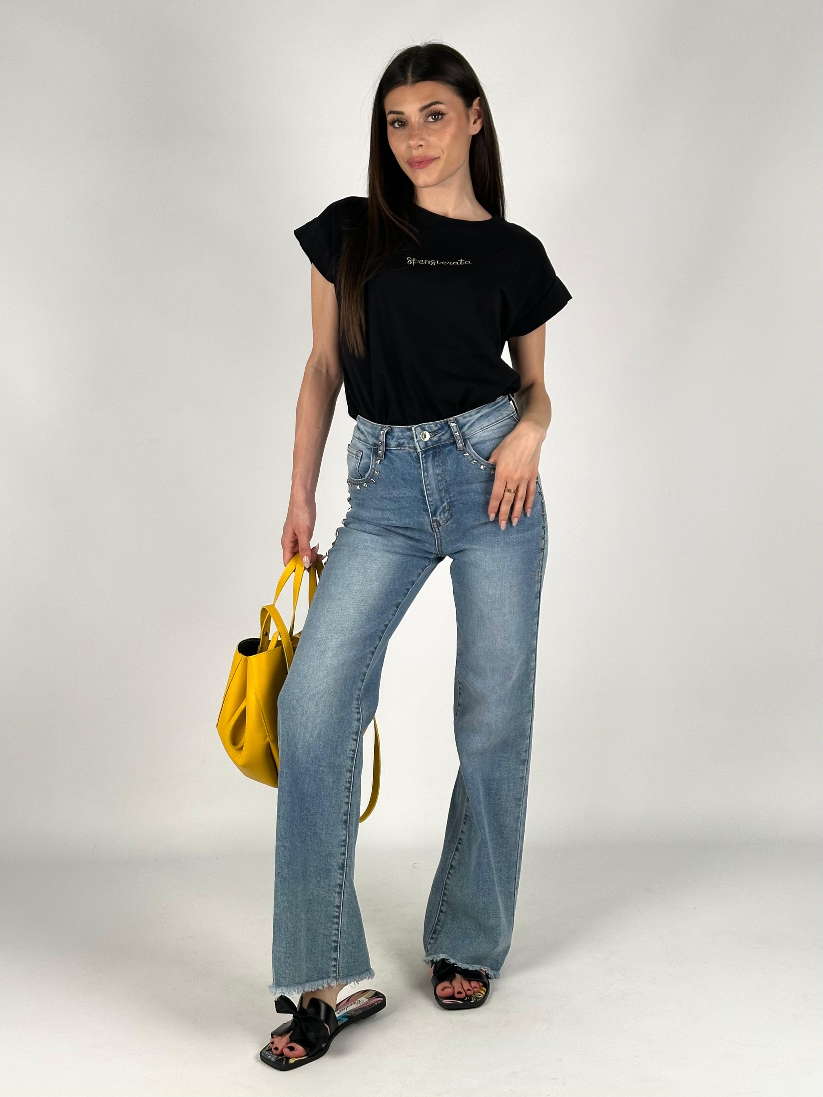 Jeans tasca borchiata