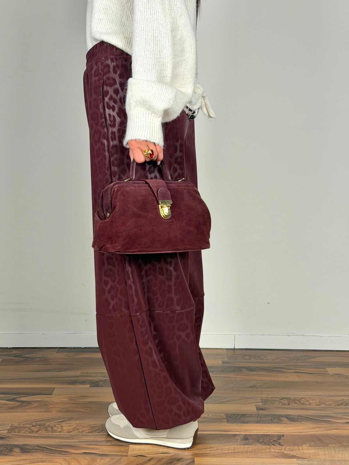Pantalone ecopelle maculato bordeaux