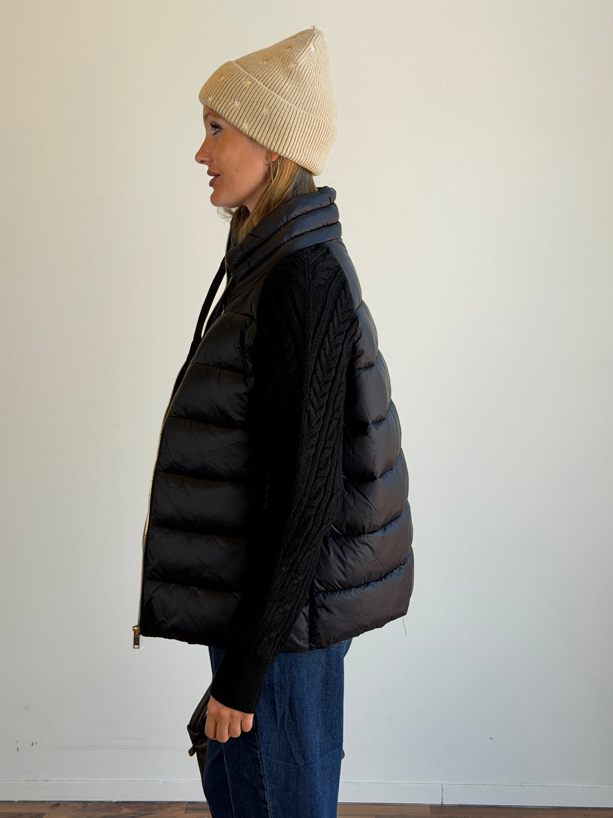 Piumino manica treccia nero