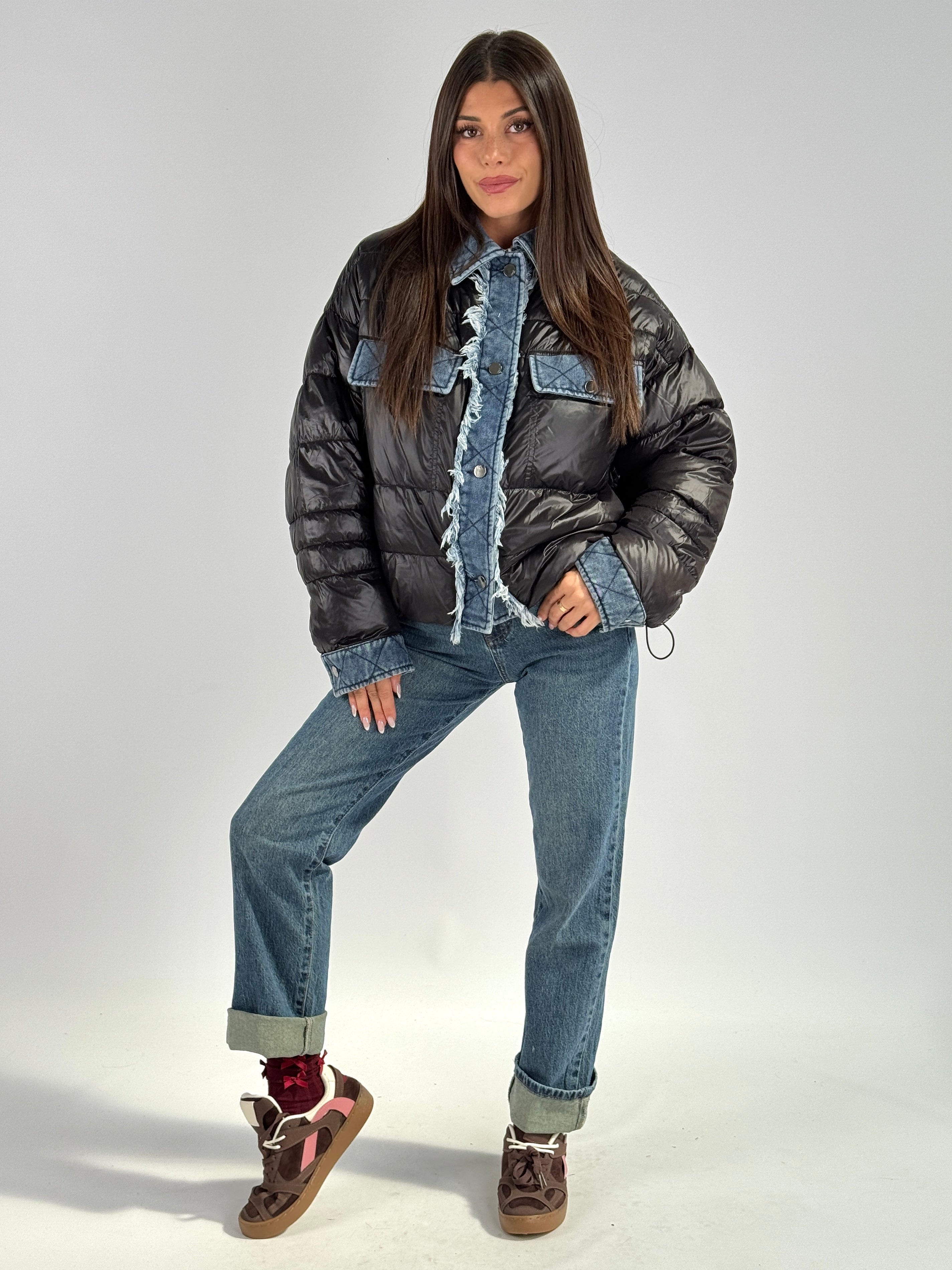 Piumino trapuntato e denim nero
