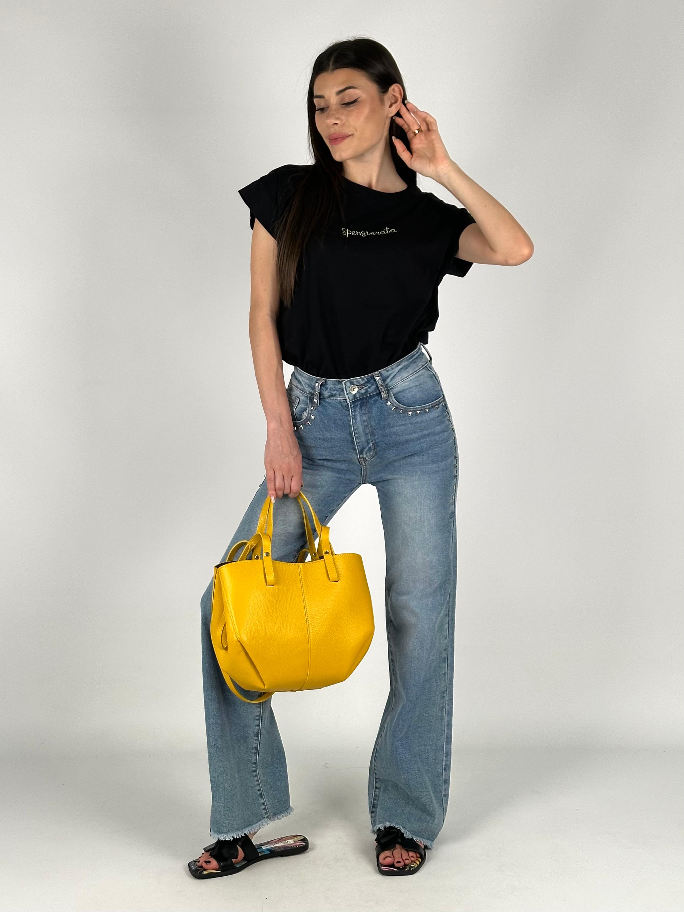 Jeans tasca borchiata