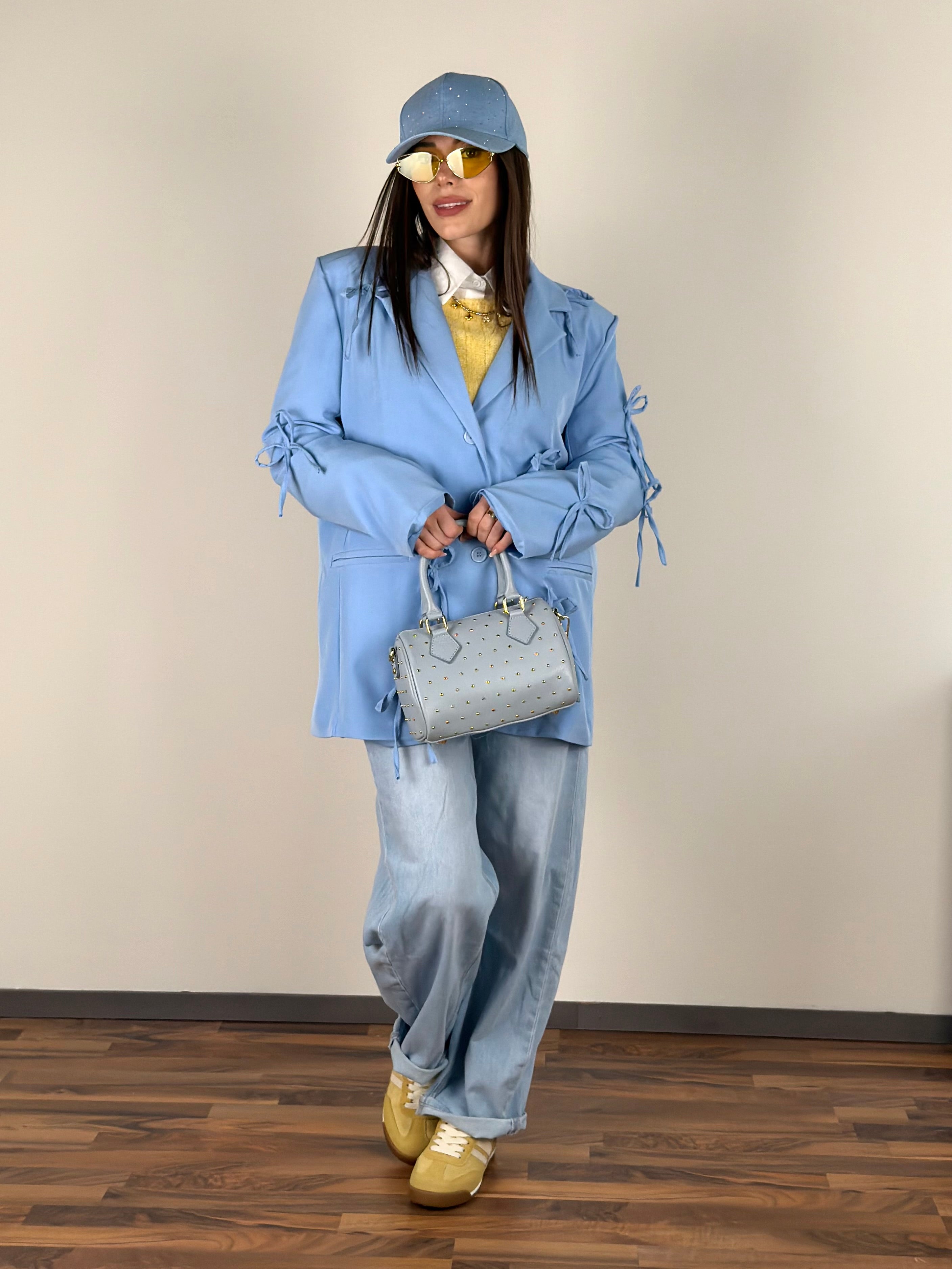 Giacca fiocchi celeste