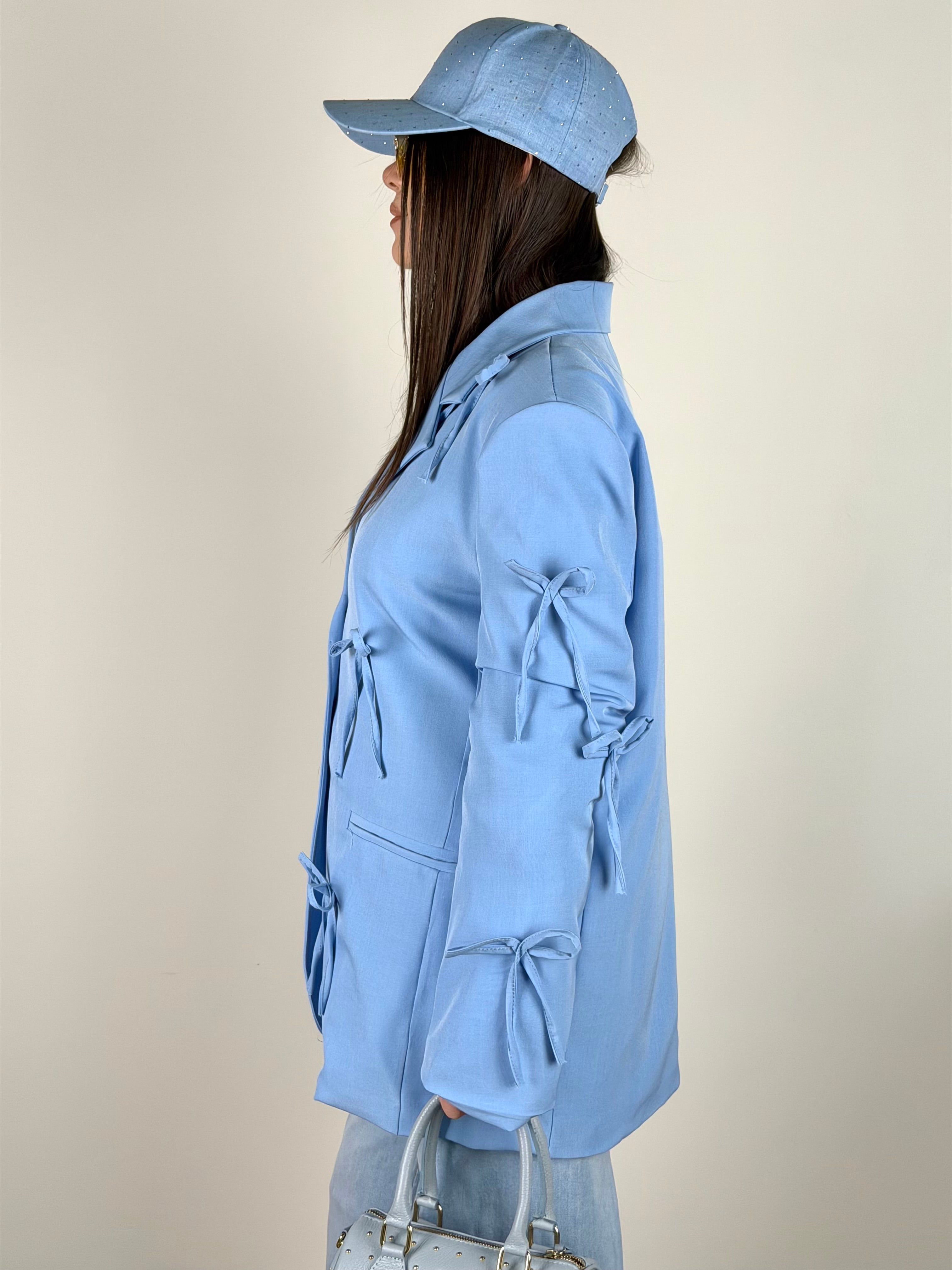 Giacca fiocchi celeste