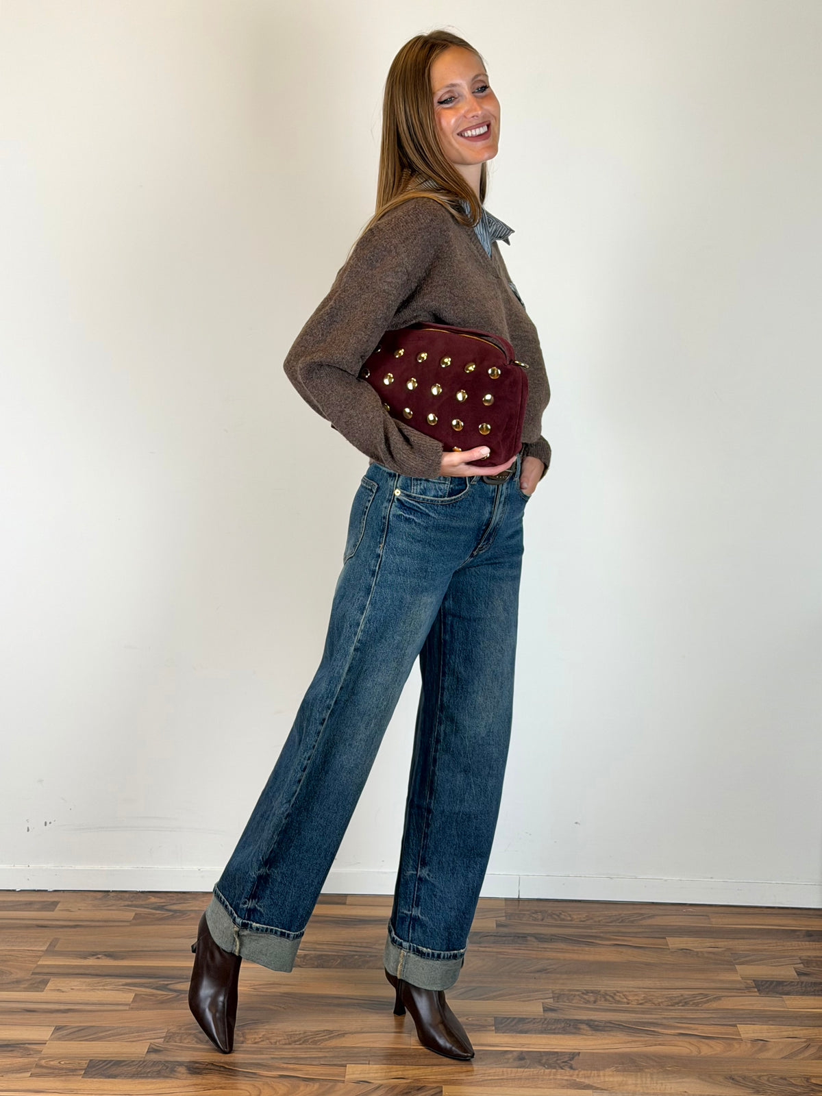 Jeans cintura borchie