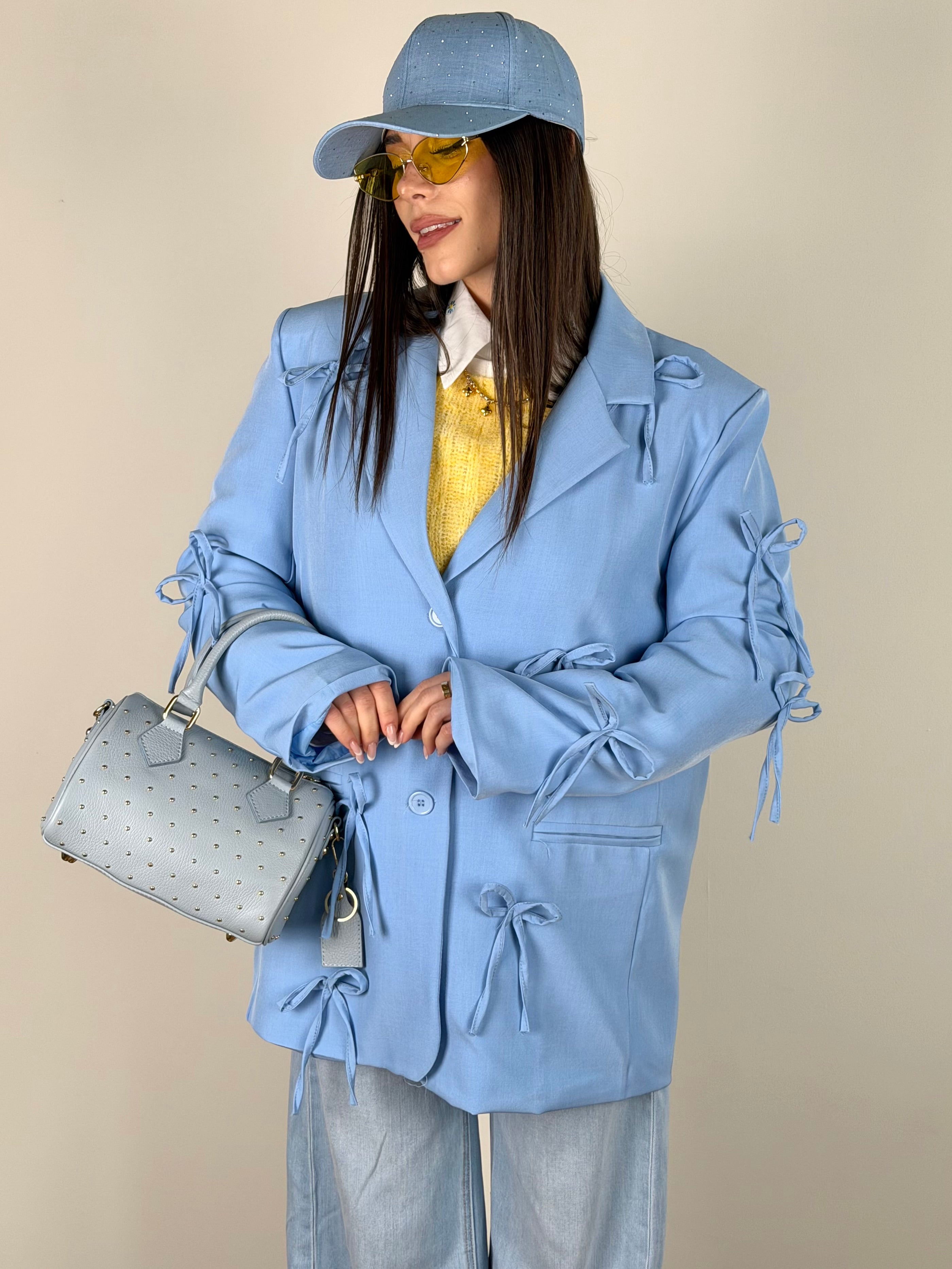 Giacca fiocchi celeste