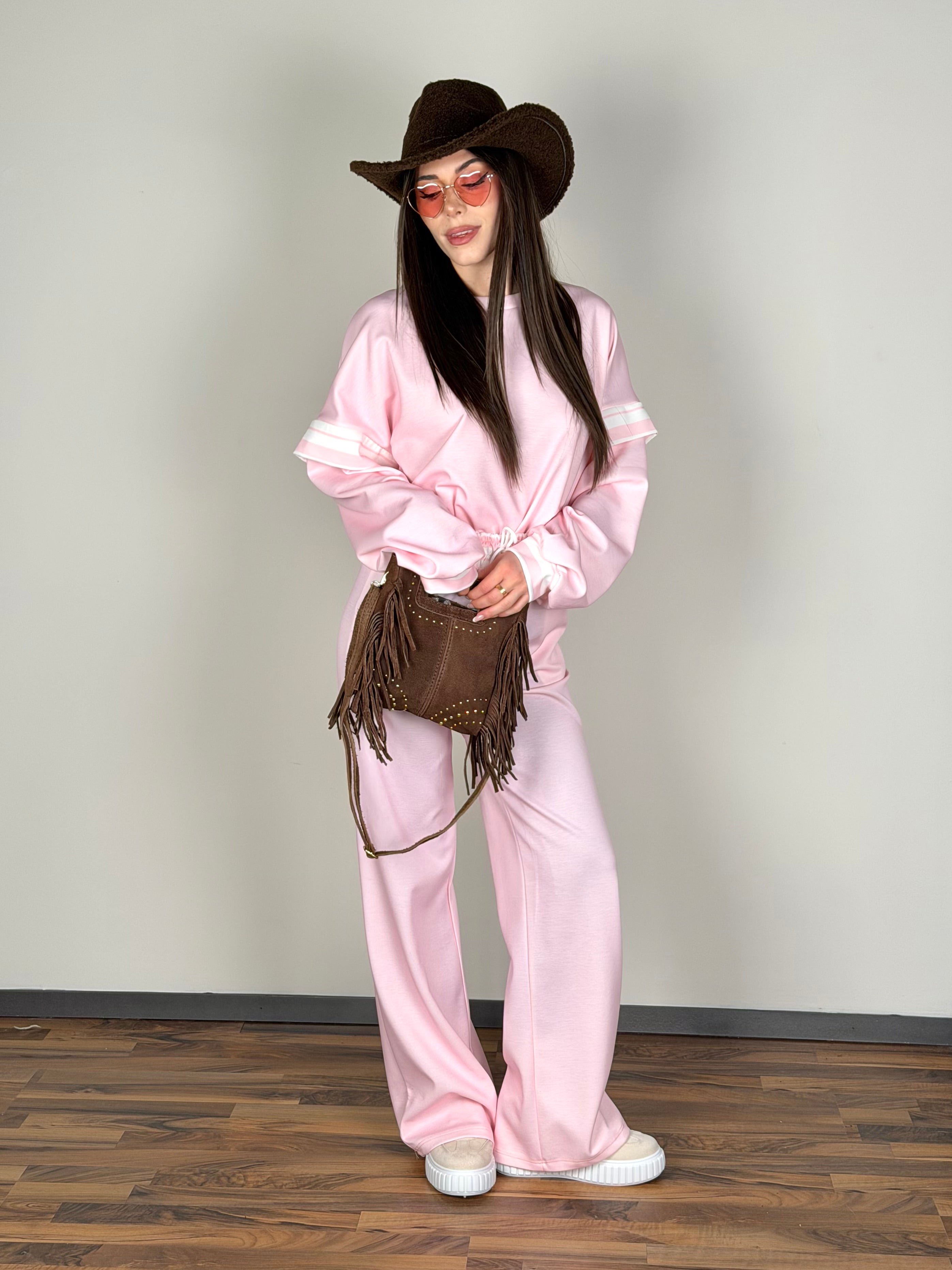 Tuta sportiva adi rosa