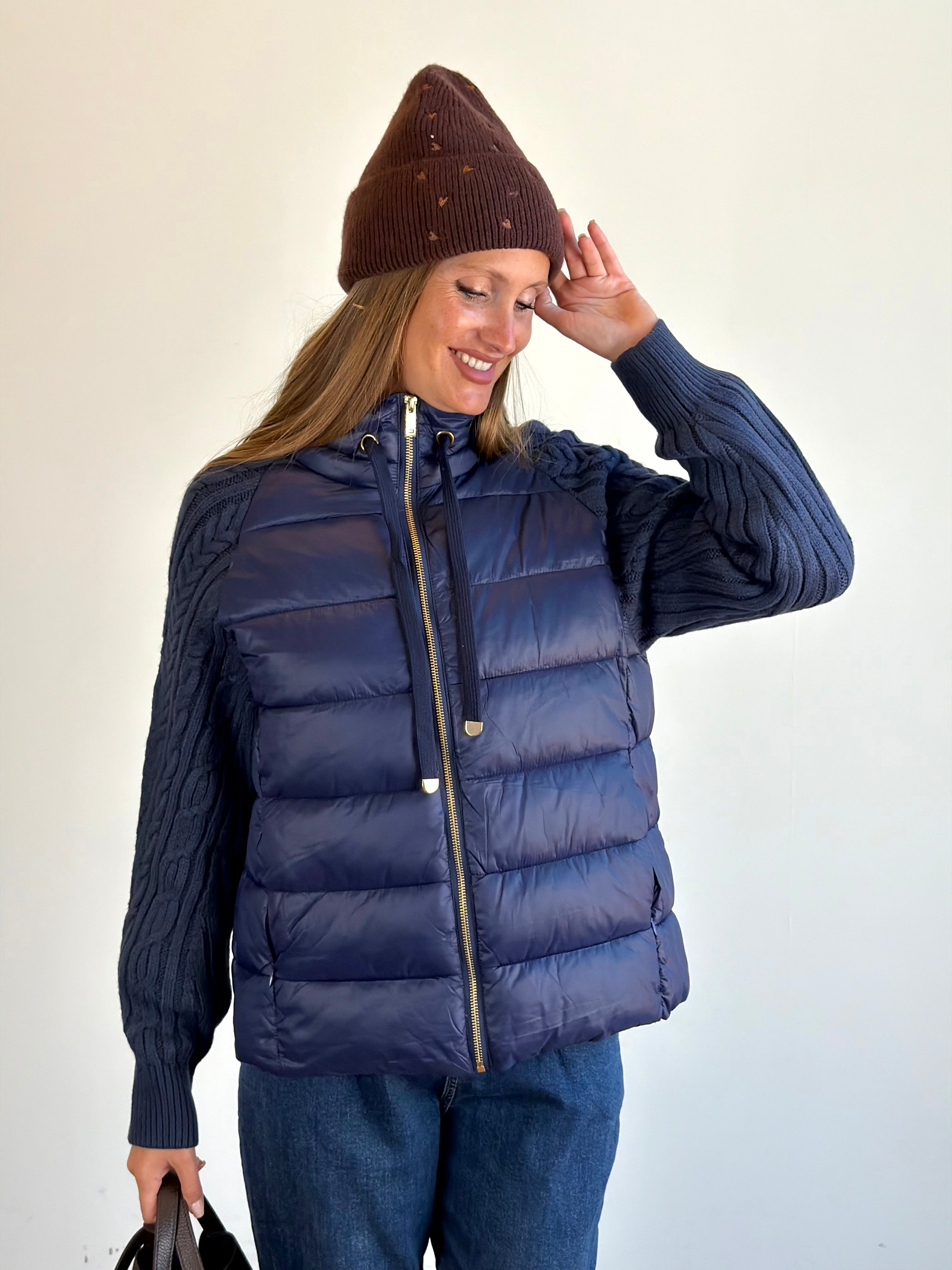 Piumino manica treccia blu