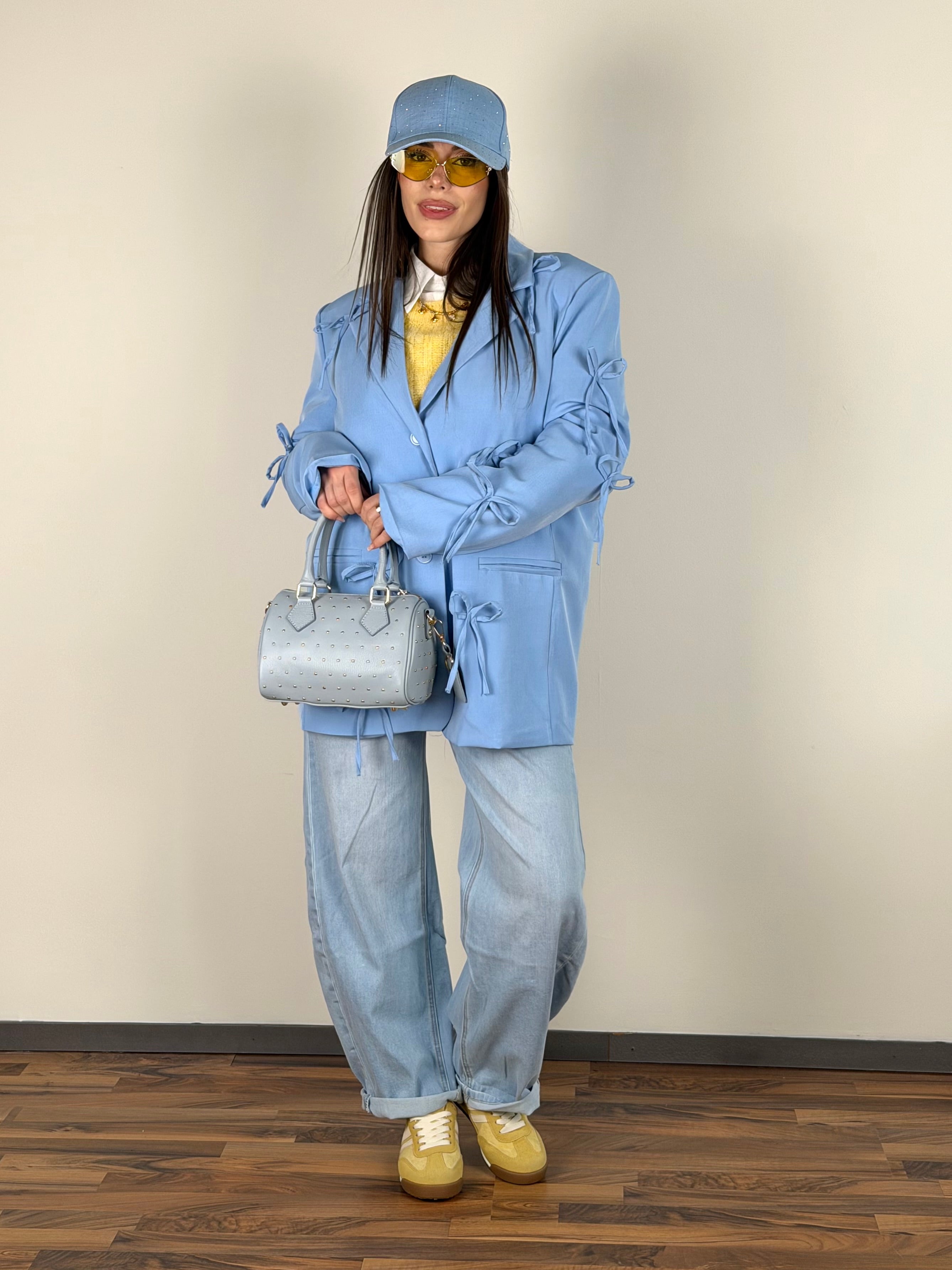 Giacca fiocchi celeste