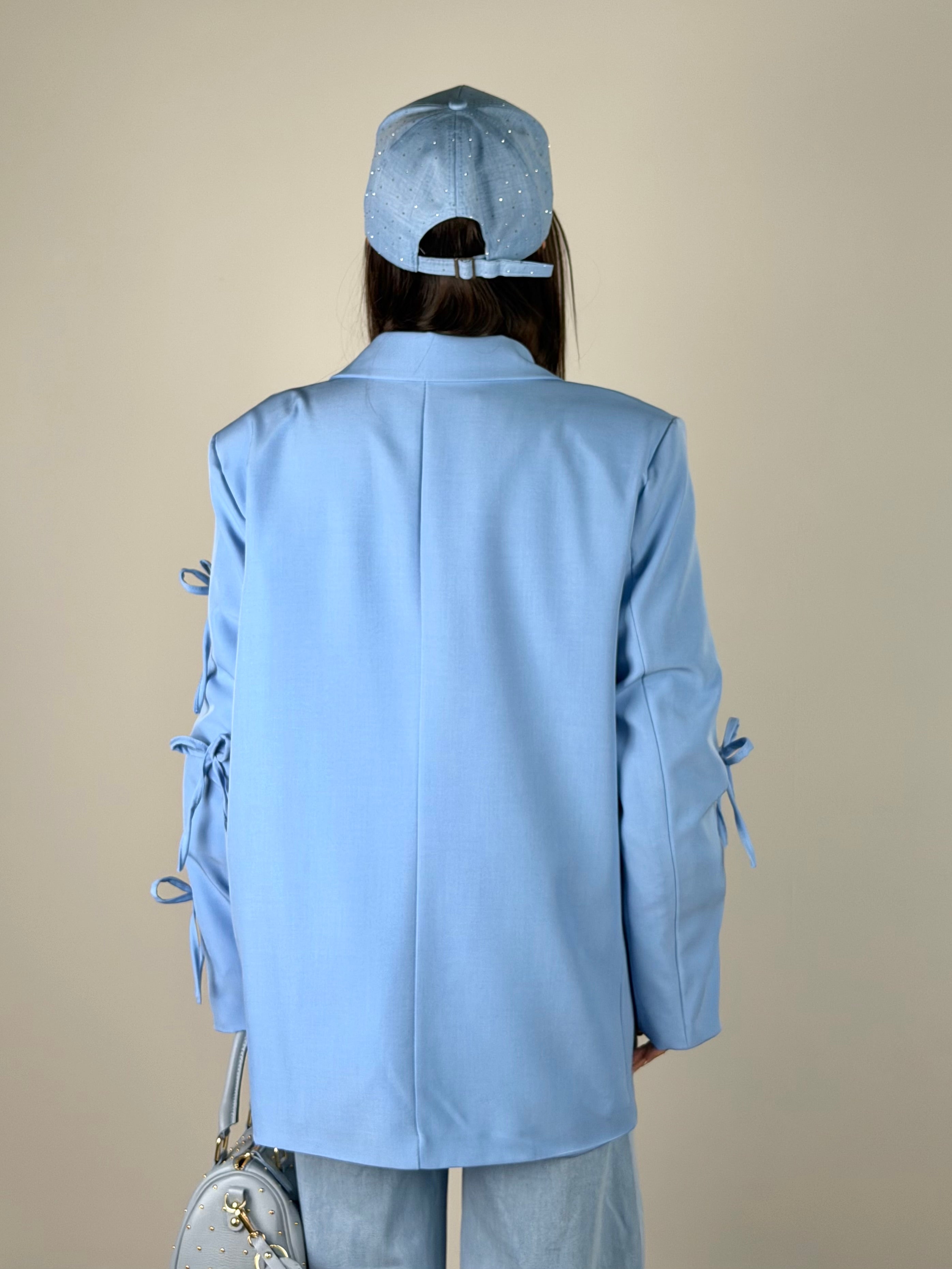 Giacca fiocchi celeste